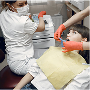 Financial consultant assisting dental practice owner with budgeting and revenue optimization