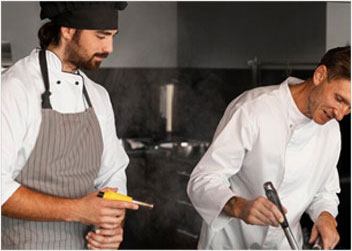 Restaurant owners in Northern Colorado reviewing business operations with accounting and tax support.